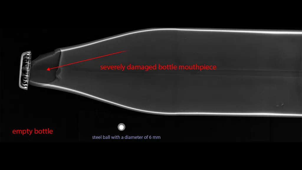 X-ray image of a severely damaged bottle mouthpiece